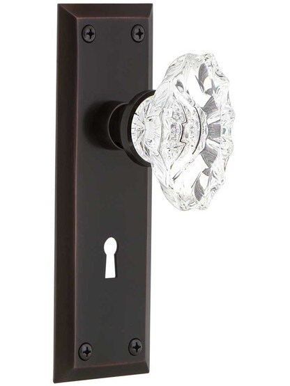 New York Door Set with Keyhole and Chateau Crystal Glass Knobs in Timeless Bronze.